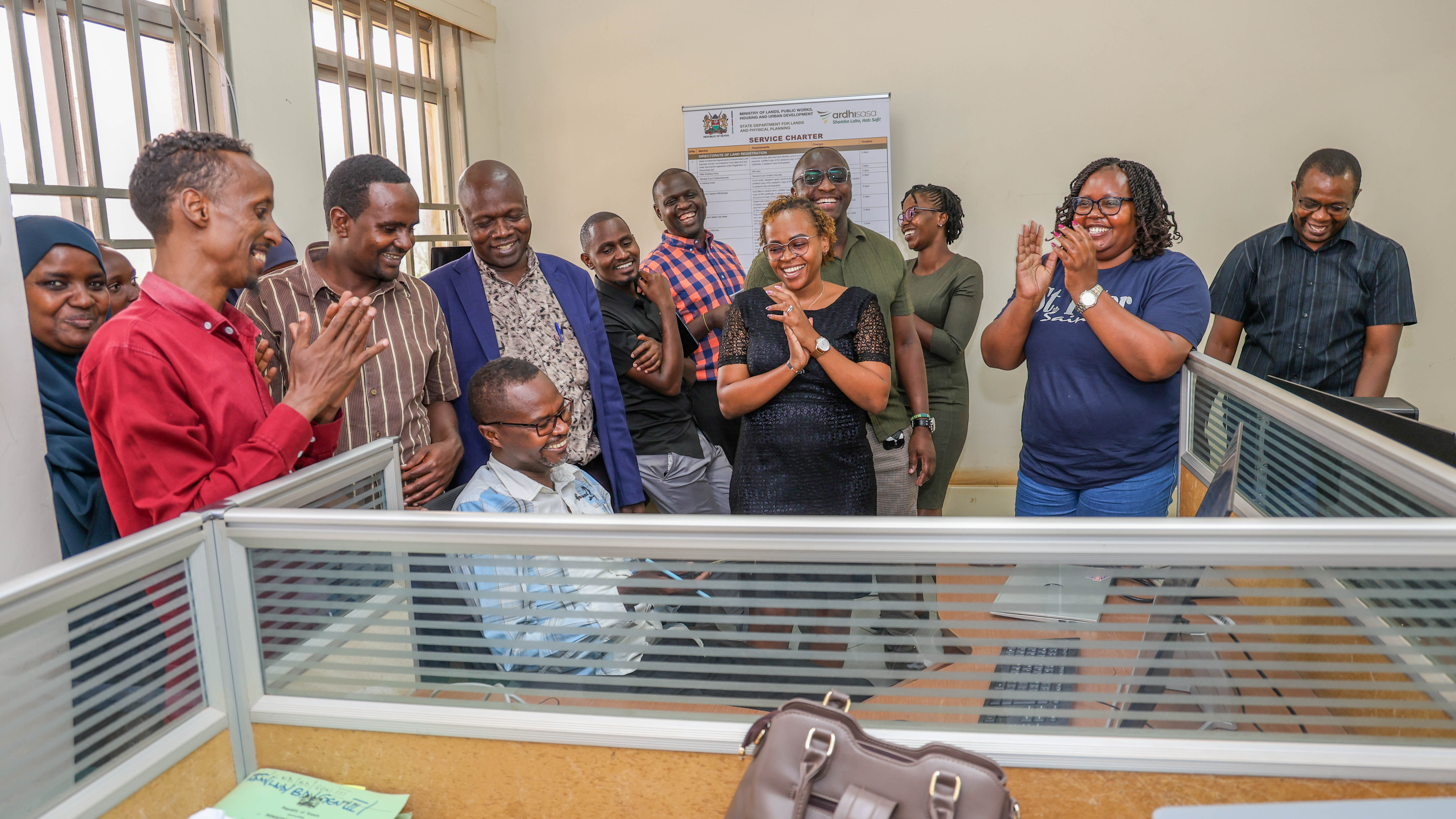 Lands Secretary Sarah Maina and other Government officials look-on as Isiolo Land Registrar John Wanjohi authorizes the first transaction on Ardhisasa in Isiolo County on July 31, 2025