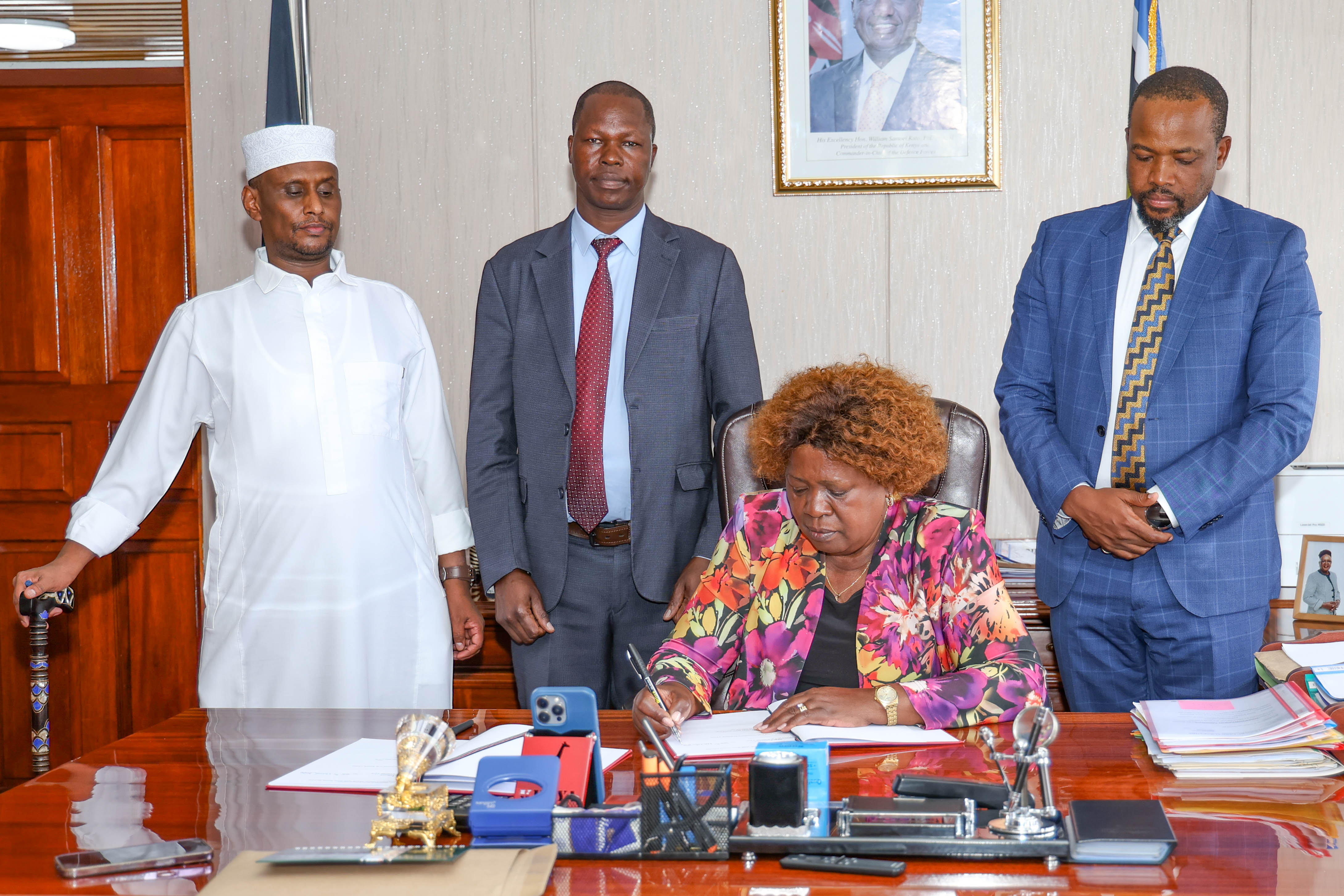 Lands CS Hon. Alice Wahome, flanked by PS National Government Coordination Ahmed Abdisalan Ibrahim, Lands PS Hon. Generali Nixon Korir, Public Works PS Joel Arumonyang during the signing of cascaded performance contracts and the mid-year assessment for the Financial Year 2025/2026. 