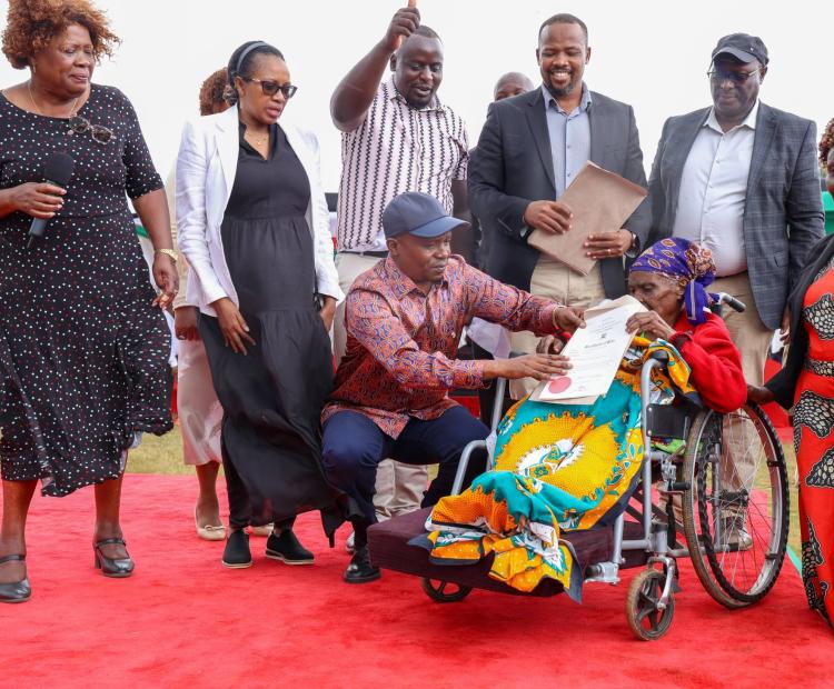 H.E. the Deputy President, Prof. Kithure Kindiki when he issued 116 title deeds to residents of Maai Mahiu